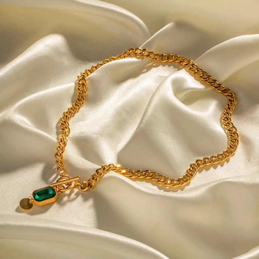 Gold electroplated emerald zircon pendant necklace on titanium steel Cuban link chain