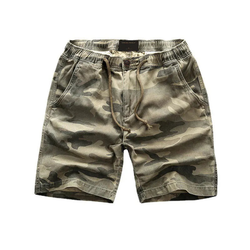 Men's green camouflage cotton workwear shorts with mid-waist design and zip fly placket