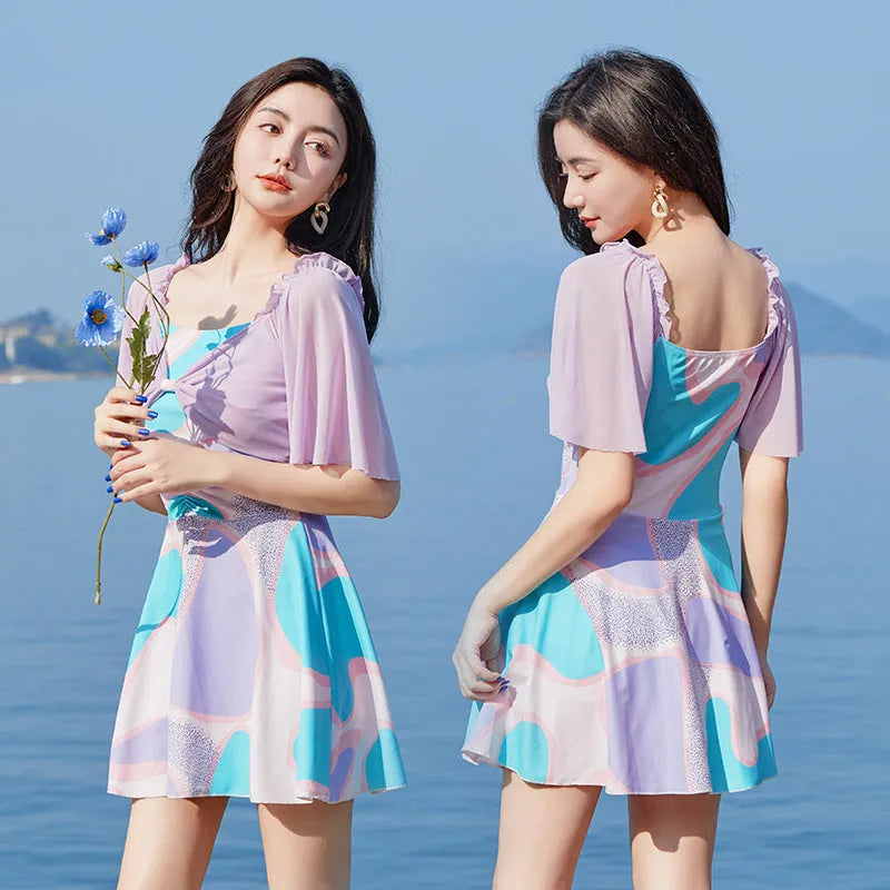 Women's high-waist floral one-piece swimsuit in light purple or light blue pattern for swimming