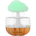White USB humidifier with aromatherapy diffuser and colour-changing night light on desk