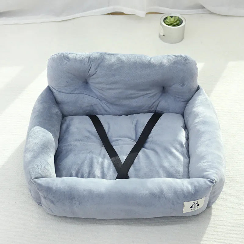 Grey and blue plaid washable fabric dog travel nest for car use, shown in two sizes.
