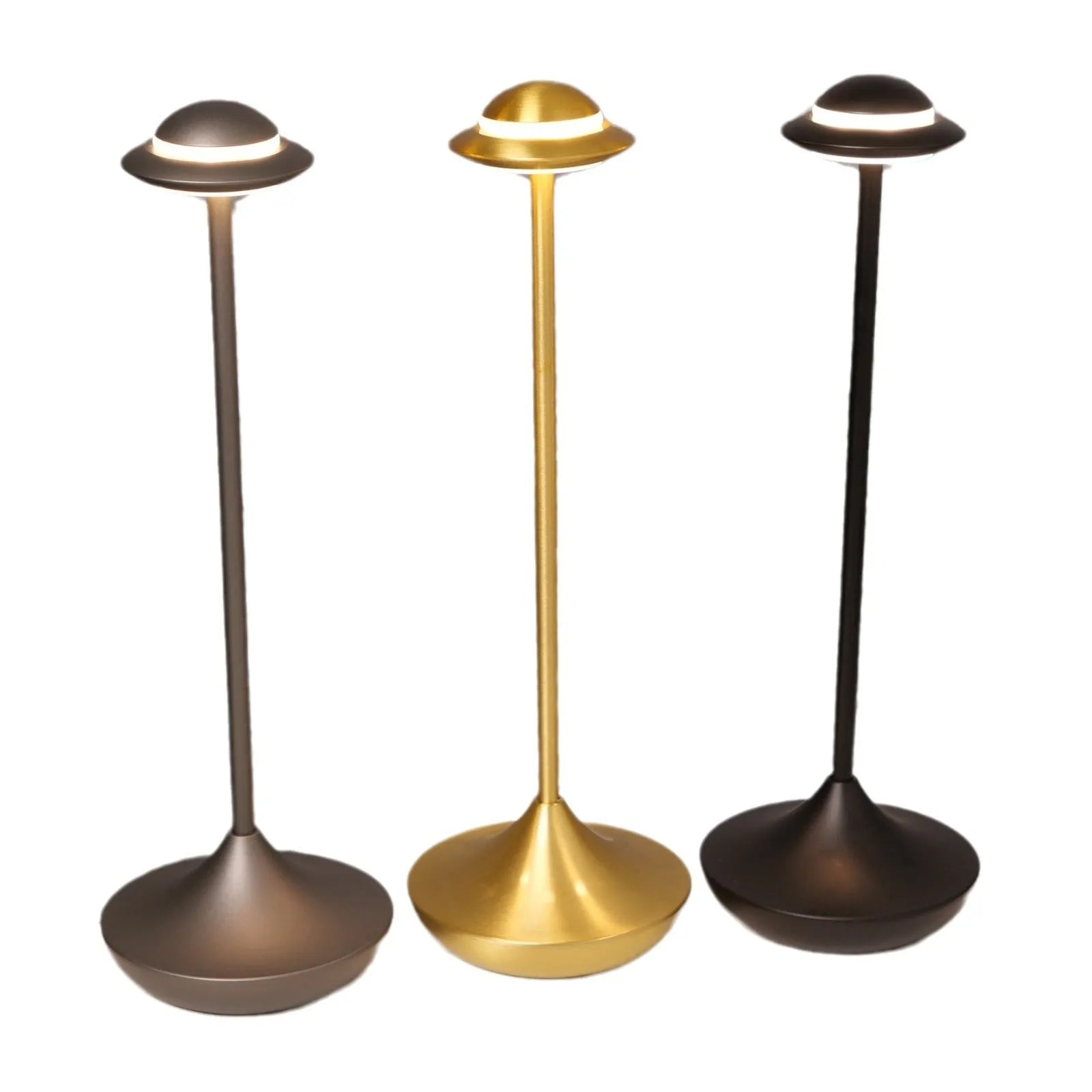 Modern UFO-shaped metal table lamp in grey on a wooden desk, showing touch controls and sleek design.