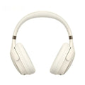 Cream coloured wireless Bluetooth over-ear gaming headset with microphone on a black background.