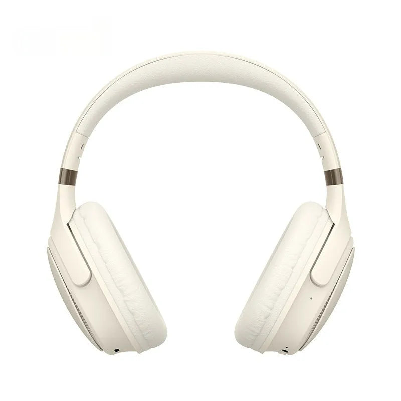 Cream coloured wireless Bluetooth over-ear gaming headset with microphone on a black background.