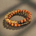 Retro style yellow tower crystal bracelet with manual processing in single or double ring design