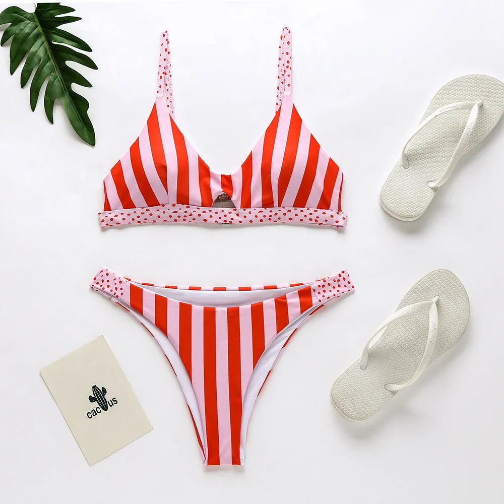 Women's black and white polka dot and red and white stripe polyester bikini set for swimming.
