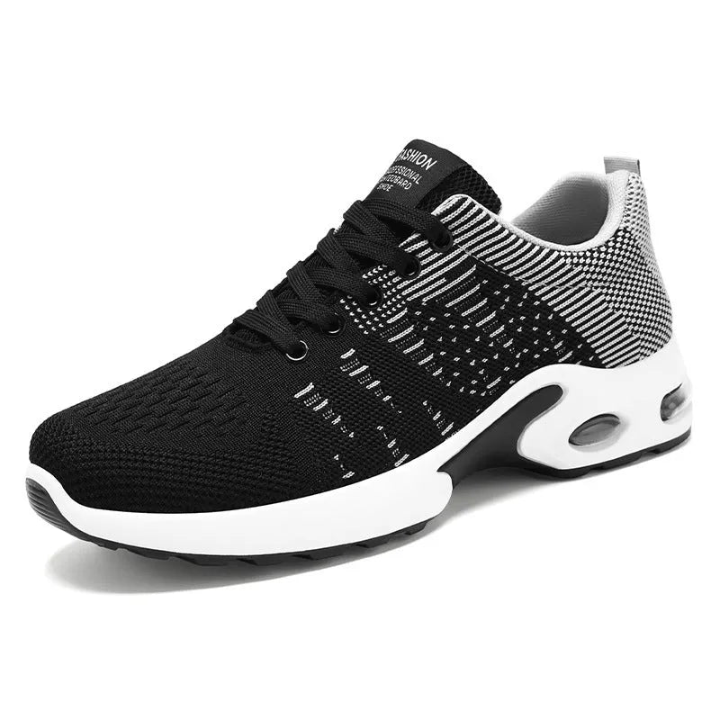 Men's black and grey Flyknit mesh sneakers with soft sole and lace-up design