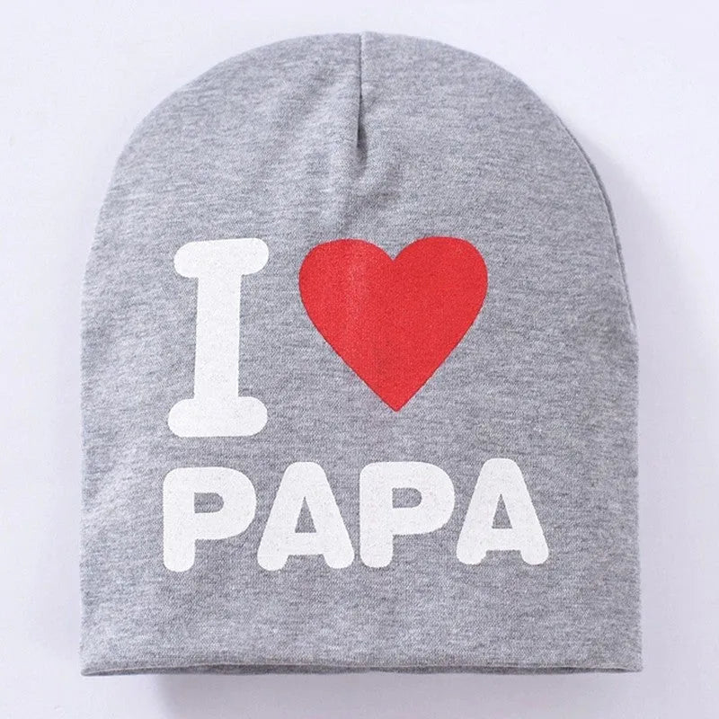 Baby hat in cotton-lycra blend for winter, shown in black with Love mama print.