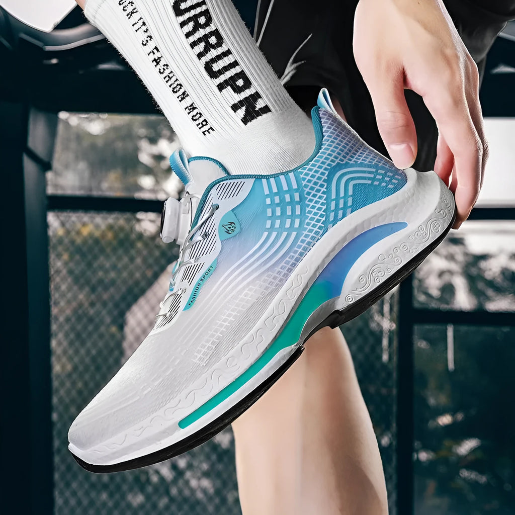 Men's white and blue sneaker with a rotating buckle and mesh upper on a rubber sole.