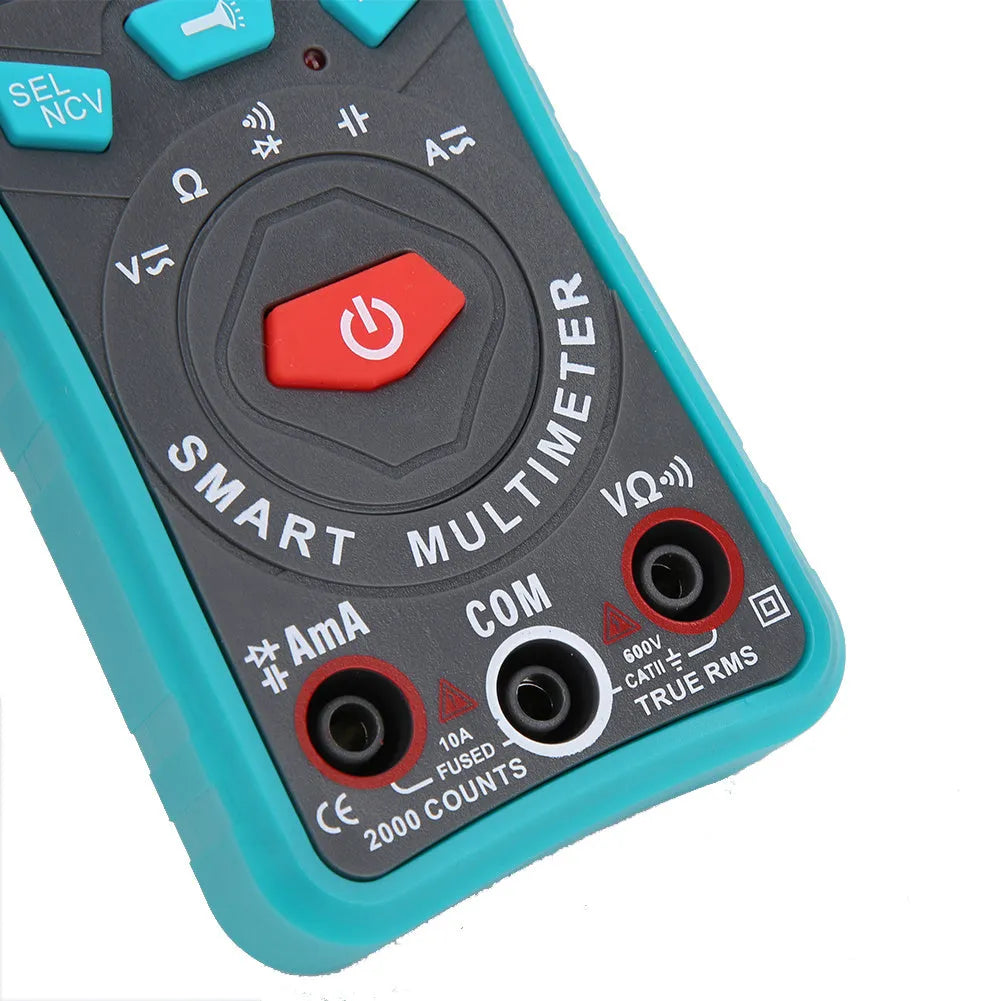 Green automatic digital multimeter with LED display on a dark surface.