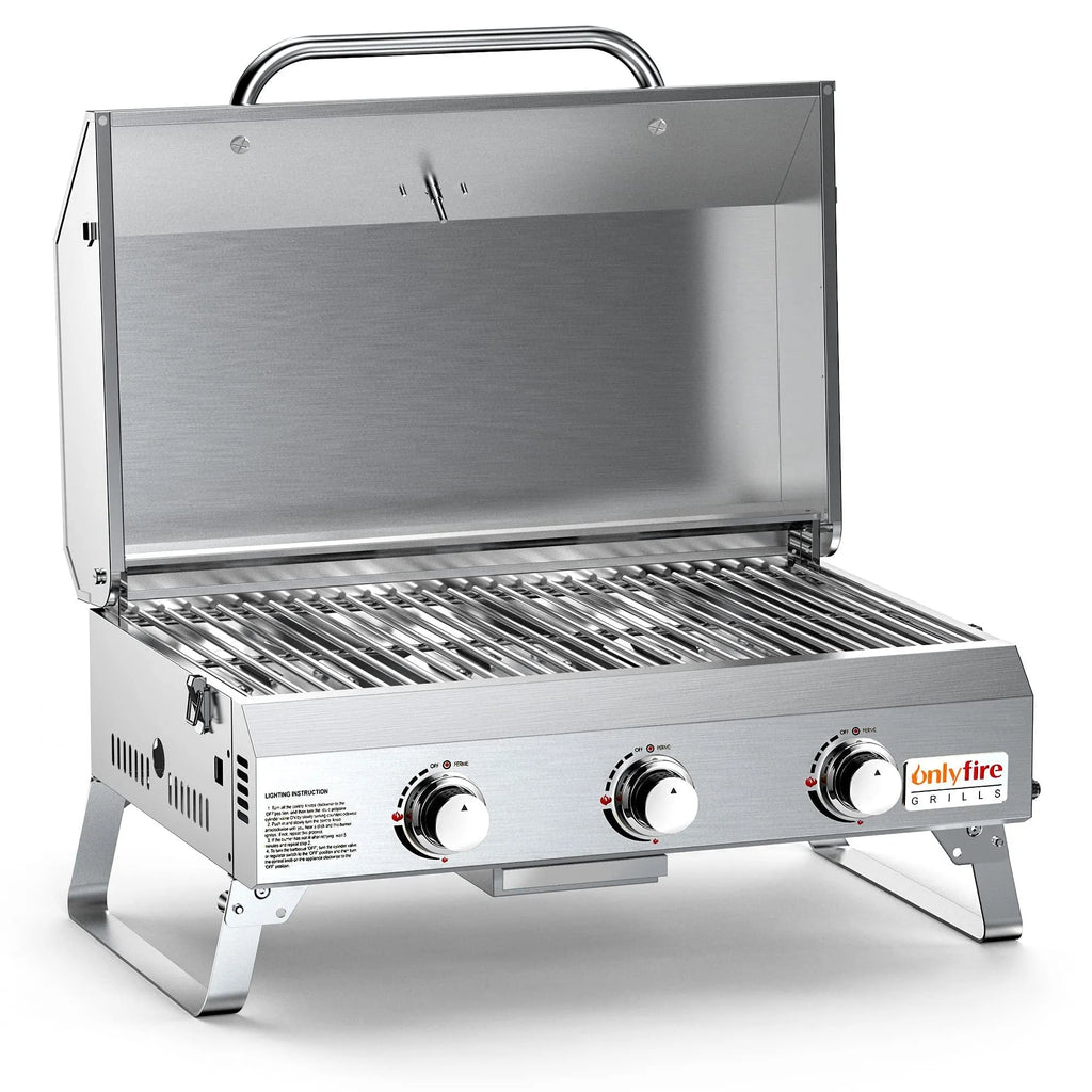 Silver desktop gas barbecue grill with three burners and foldable legs.