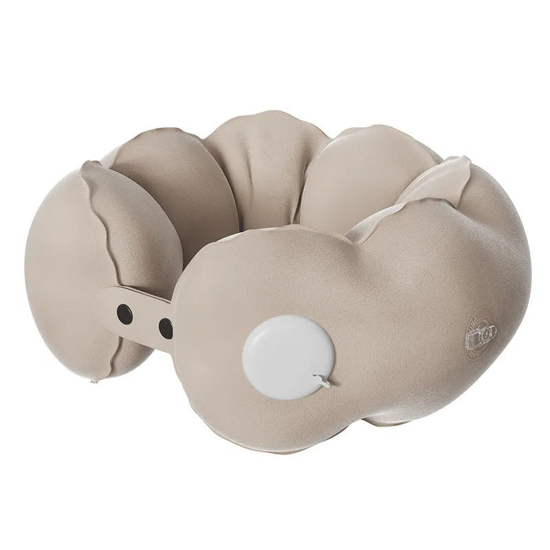 Inflatable cloud bubble coloured U-shaped travel neck pillow with cartoon design, shown deflated and portable.