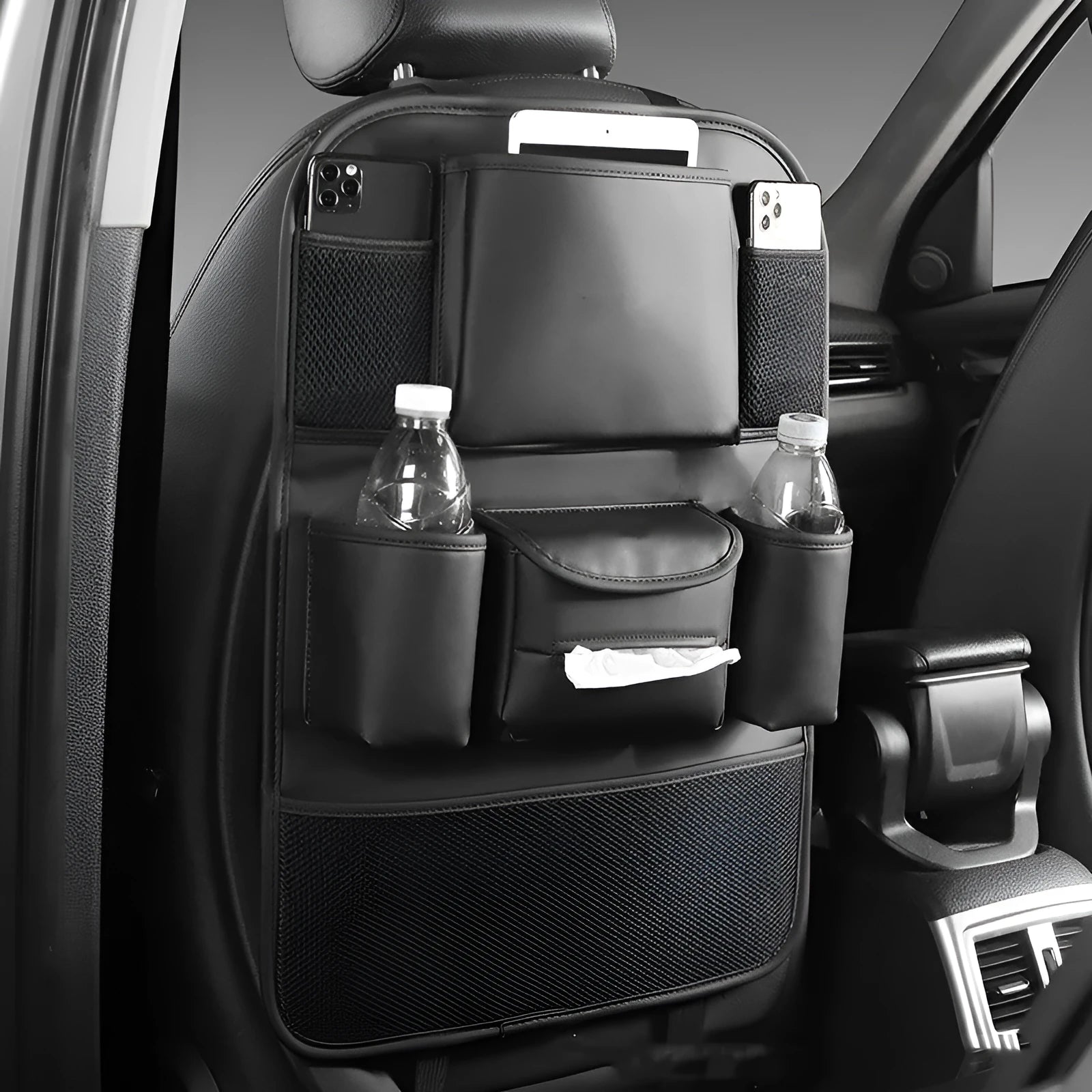 Leather car seat back storage bag in four colour options mounted behind vehicle seat