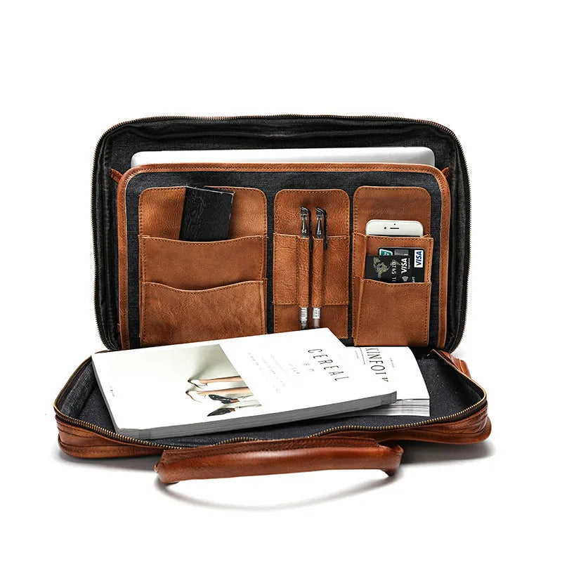 Brown vintage leather men's briefcase showing internal organiser pockets for laptop, documents, and phone.