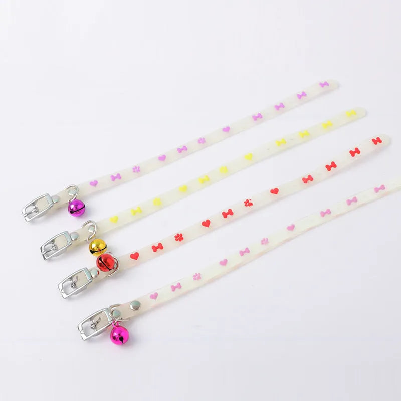 Luminous cat collar with adjustable silicone strap and metal bell in one of four patterns