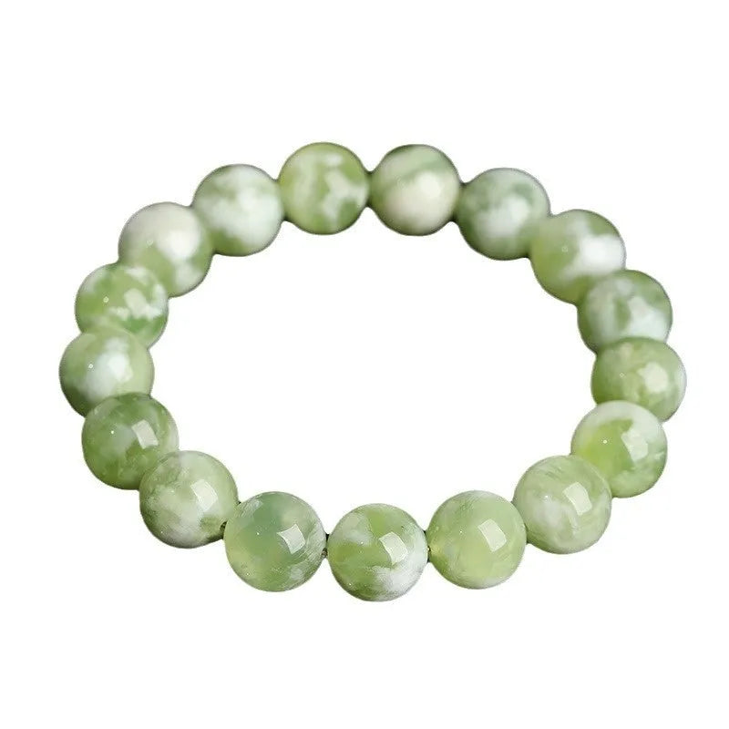 Green milk-in-water Xiuyan jade bracelet with polished finish and geometric unisex styling