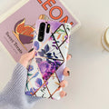 Huawei phone back cover with white floral lattice pattern on a dark background