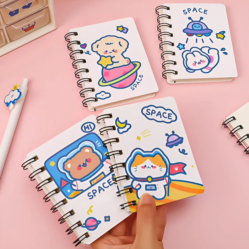 Compact astronaut series flip notebook with space-themed cover, shown closed.