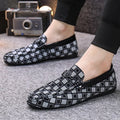 Men's plaid slip-on shoes with artificial PU uppers, flat heel, and cotton lining in black colour