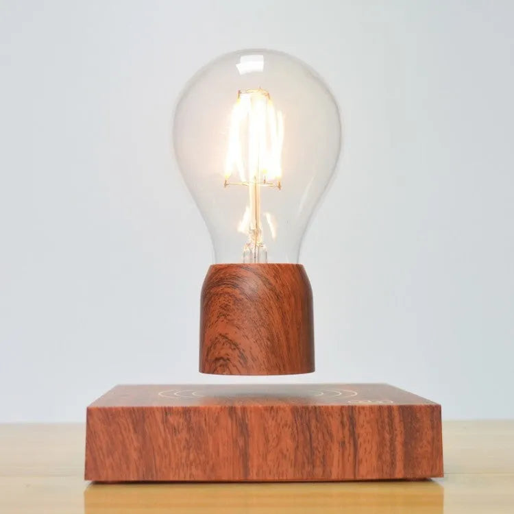 Magnetic levitation floating light bulb with imitation wood base.