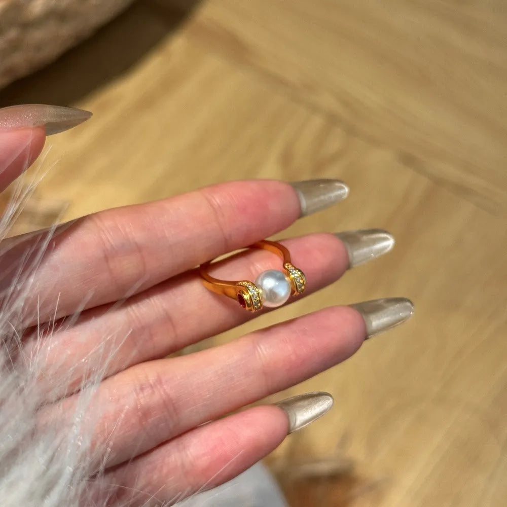 Gold colour silver female ring with geometric round pearl design, sizes 6, 7 and 8