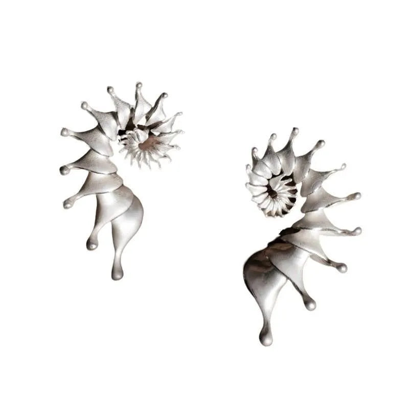 Three-dimensional matte conch stud earrings in alloy with irregular shape