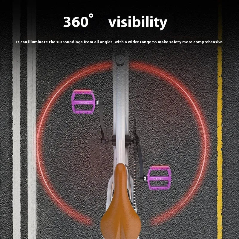 Pair of aluminium alloy bicycle pedals with integrated 710 LED lights in a choice of colours.