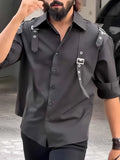 Men's black regular fit button-up shirt made from polyester fabric.
