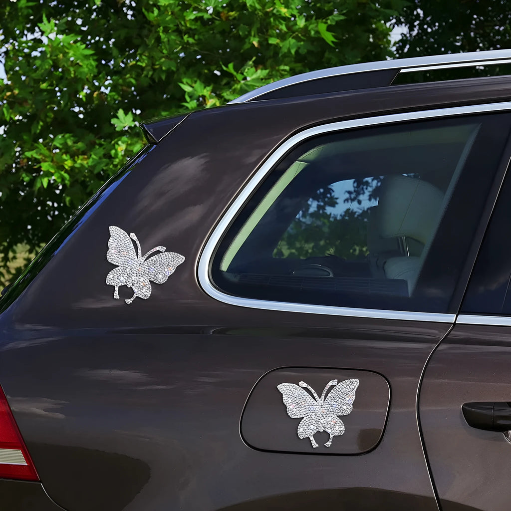 Glass diamond-encrusted car sticker in bear paw or butterfly design, measuring 7cm by 6cm.