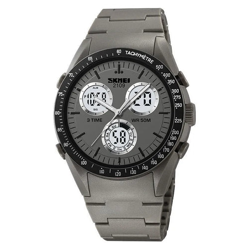 Unisex digital watch with camouflage strap, resin lens, and stainless steel button on a wrist.