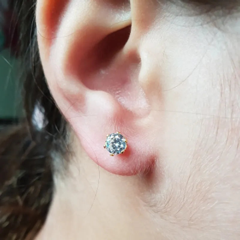 Disposable ear piercing gun with gold lavender zircon crown stud earring made from 316L stainless steel