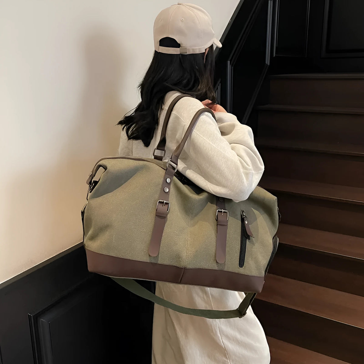 Canvas travel shoulder bag in solid green colour for leisure use