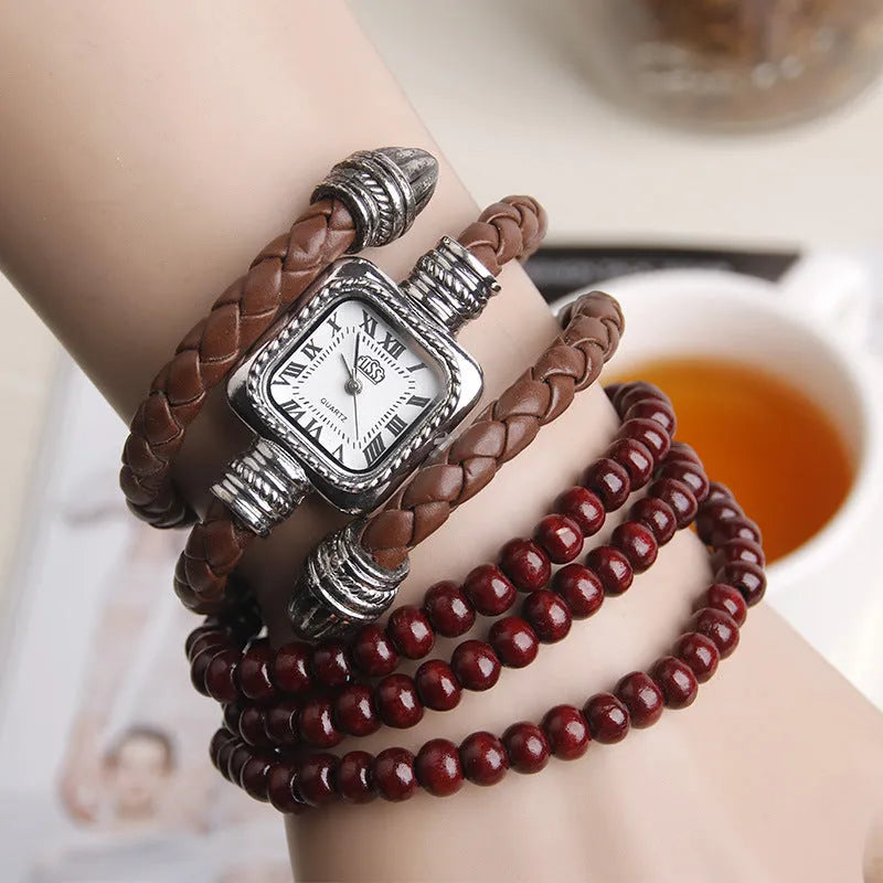 Snake bracelet quartz watch with leather strap and alloy buckle in black colour option