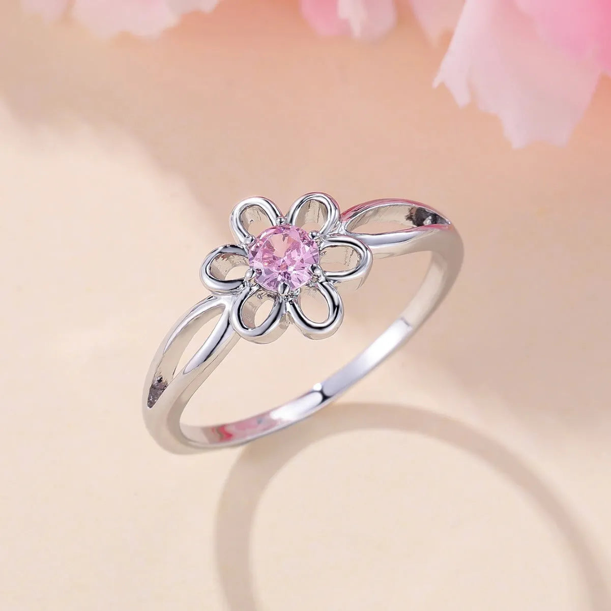 Lady's copper flower hollowed ring with electroplating finish in platinum pink diamond
