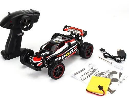 Blue 1:18 scale remote control off-road drift car with 2.4Ghz transmitter on a flat surface.