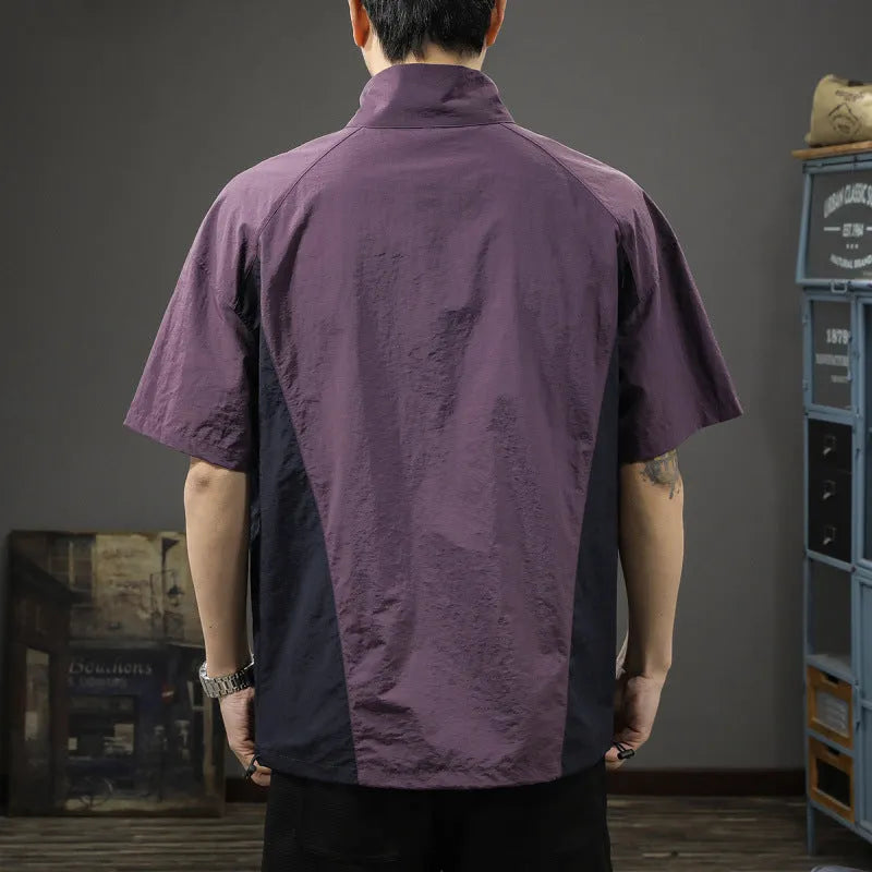 Brown men's half-zip stand collar short sleeve shirt with a fleece lining.