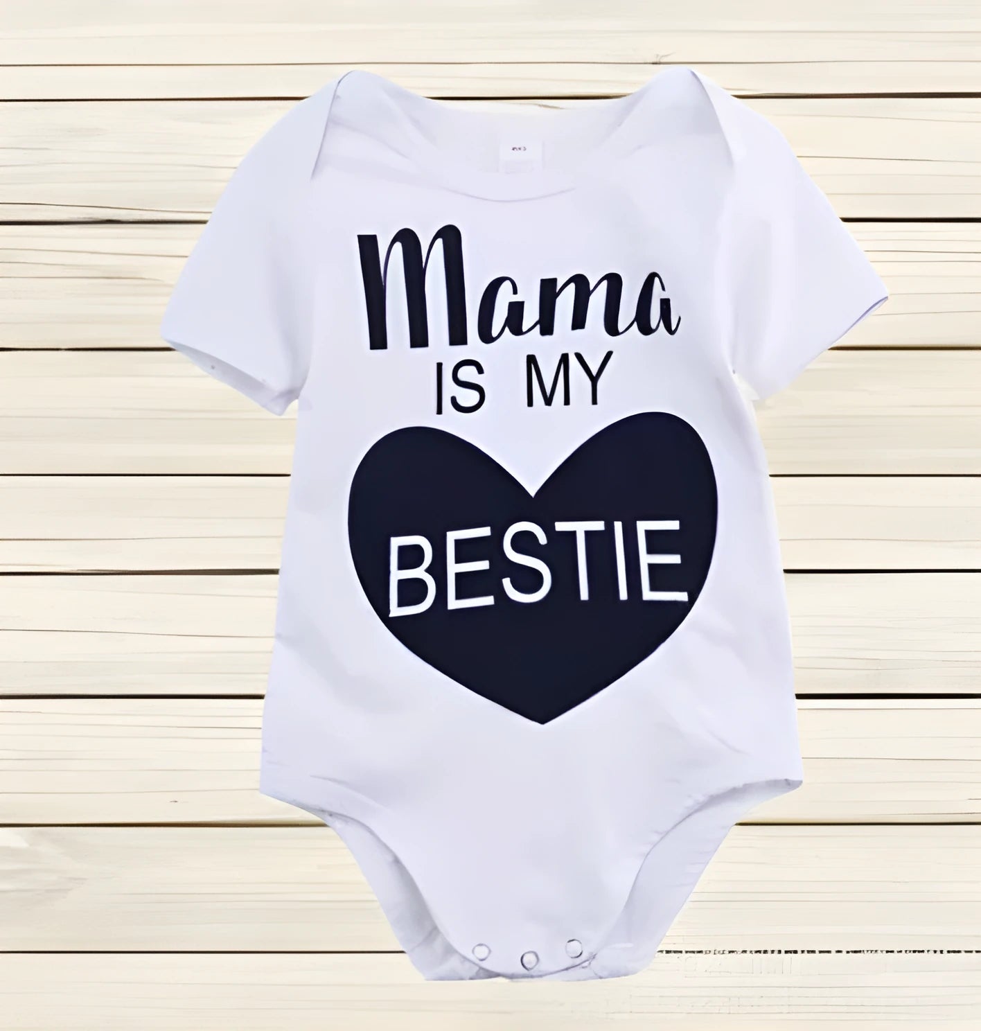 White baby romper with black 'Mama is my BESTIE' text print on front
