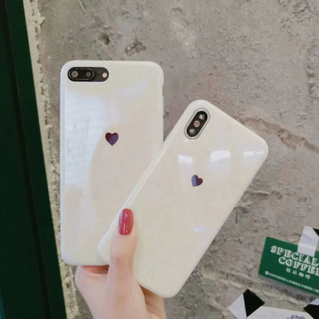 Clear blue light filtering iPhone back cover case shown in blue/white and white colour variants