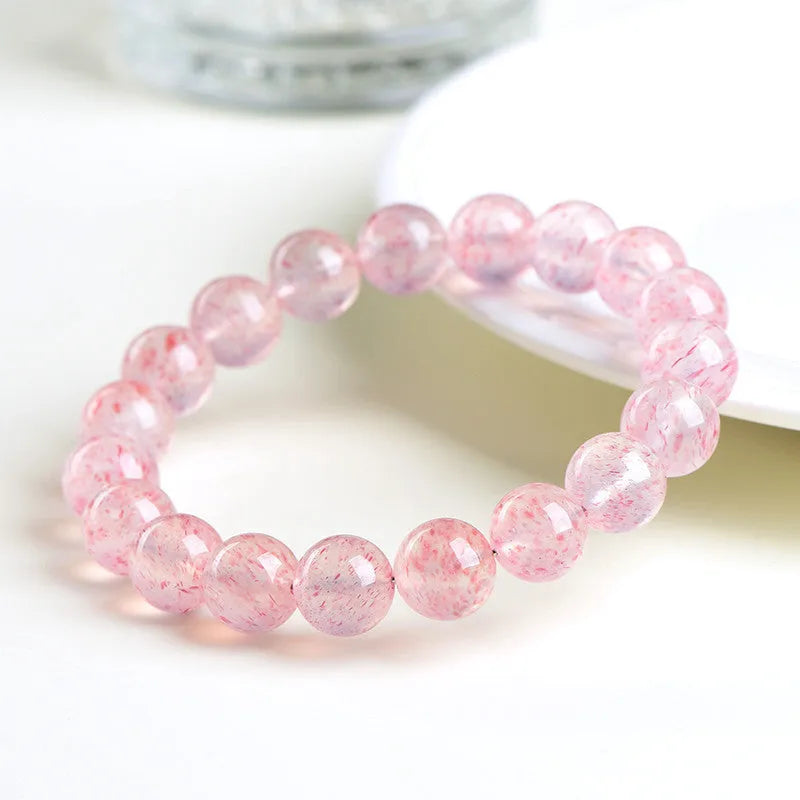 Natural white water strawberry quartz crystal bracelet with 10-10.8mm round beads.