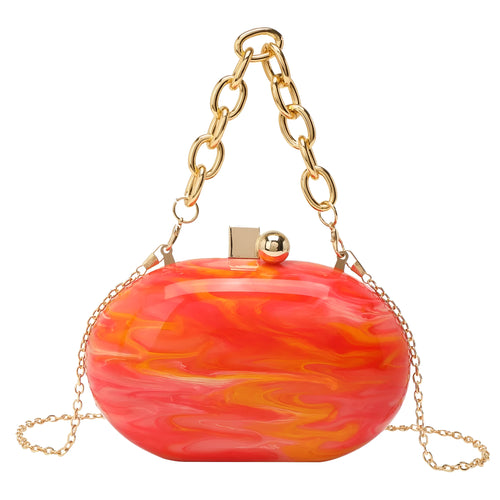 Hard acrylic oval clutch bag with chain strap in a pearlescent colour with phone and file compartments visible.