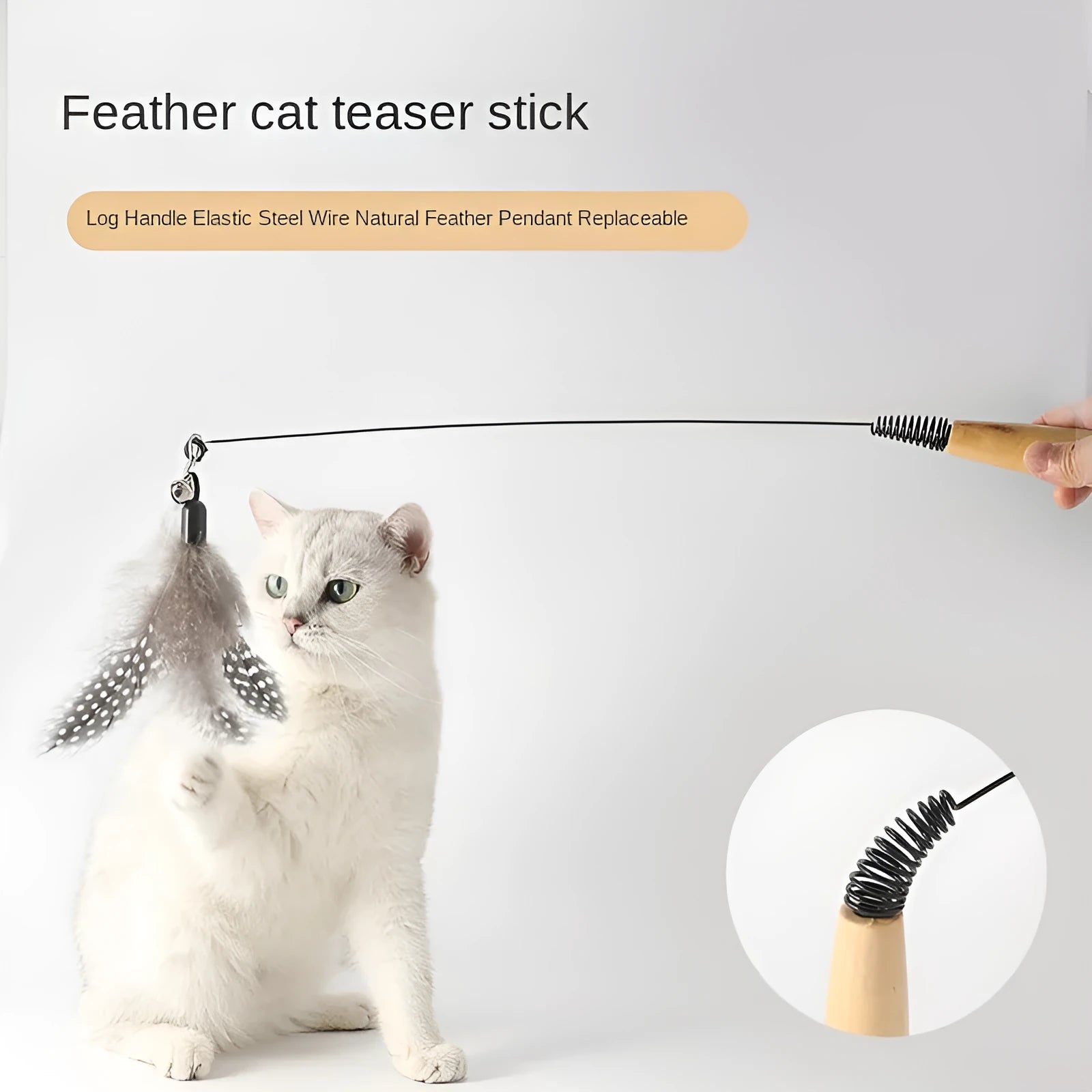 Cat teasing stick toy with wooden handle, bell, and feather head in selected colour