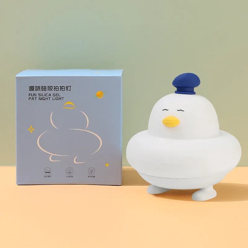 Soft silicone LED night lamp with blue duck design, 500mAh rechargeable battery, and USB charging cable