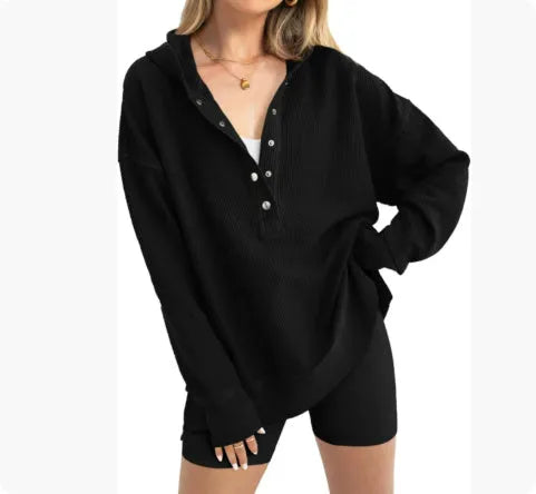 Women's solid colour loose-fit pullover sweater with raglan sleeves in peacock green.