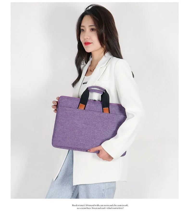 One-shoulder laptop bag in Oxford cloth, available in black, grey, pink, purple, and blue for 12 to 15.6 inch laptops.