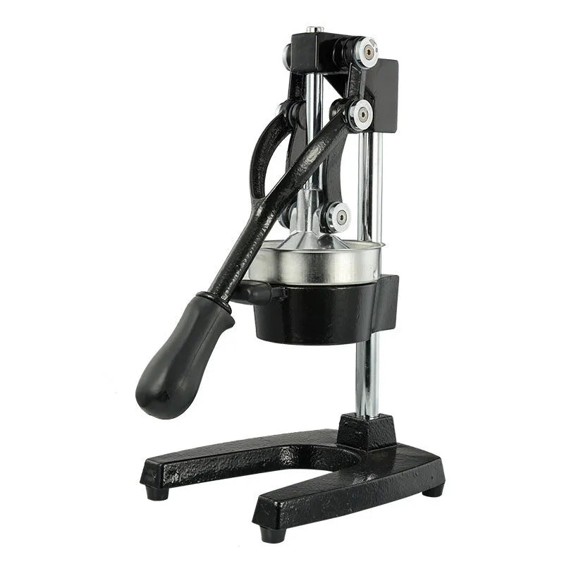 Black and white manual cast iron juice press with stainless steel funnel, standing 40cm high.