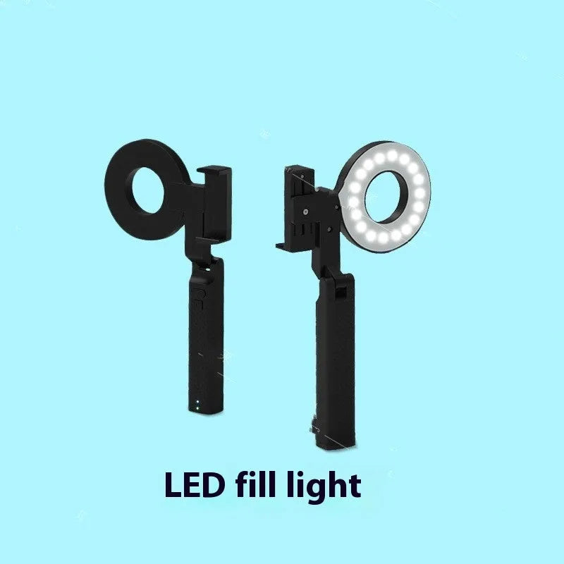 Black portable handheld LED fill light for mobile phone photography with adjustable brightness settings