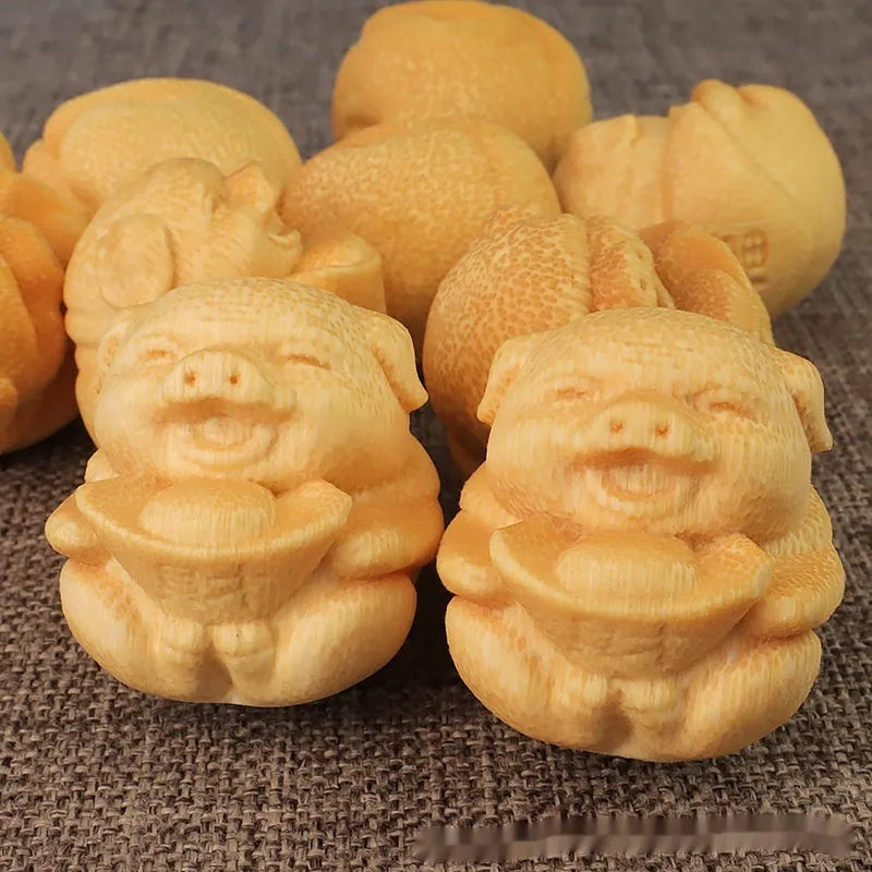 Solid bamboo carved pig ornament with traditional Chinese carving techniques measuring 4cm height