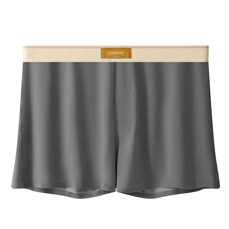 Pack of three men's solid colour loose fit ice silk nylon underwear on a mid waist mannequin.
