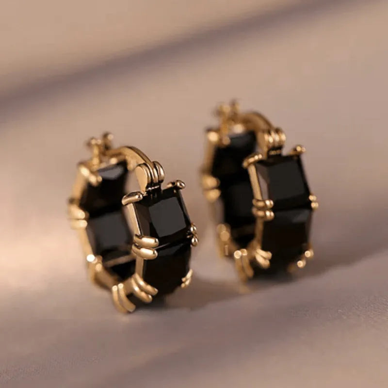 Geometric U-shaped women's earrings with zircon stones and gold plating