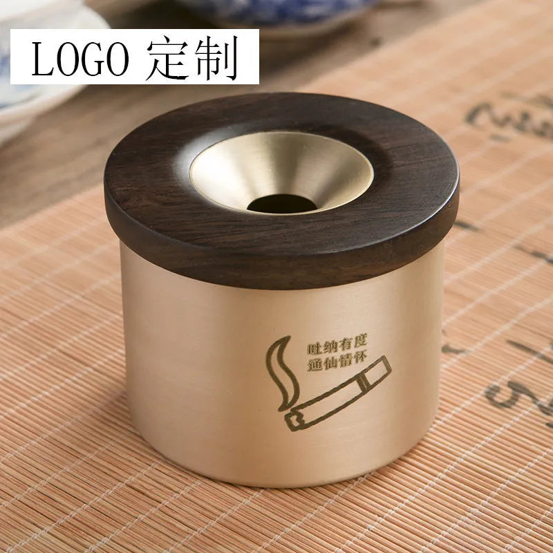 Retro brass ashtray with wooden lid in copper construction for living room use